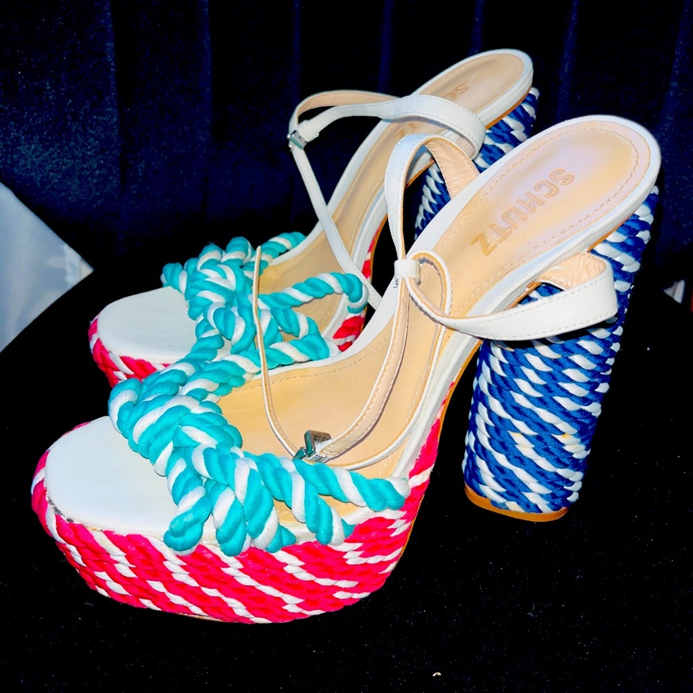 Red blue and white schutz platforms great to wear wit anything. Good conditions